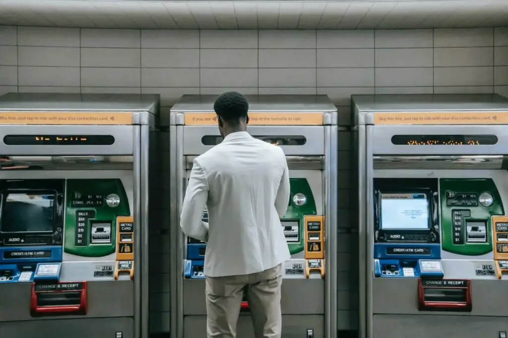 A man withdrawing money from an ATM