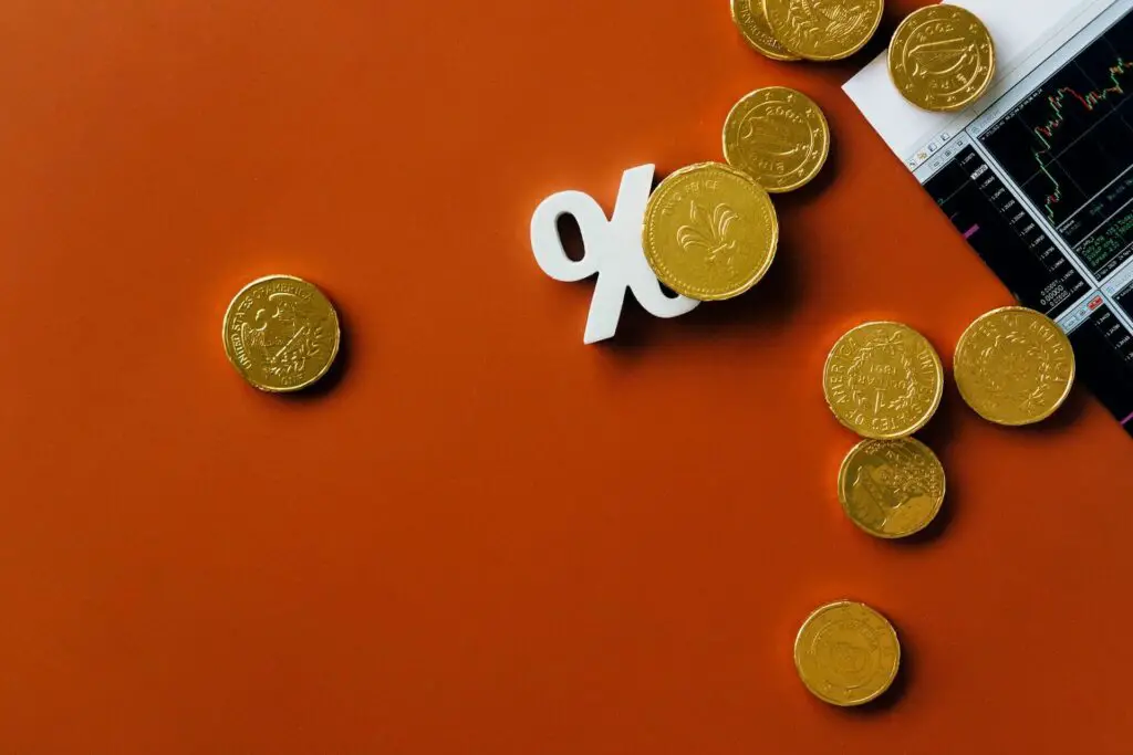 A pile of coins on a red background