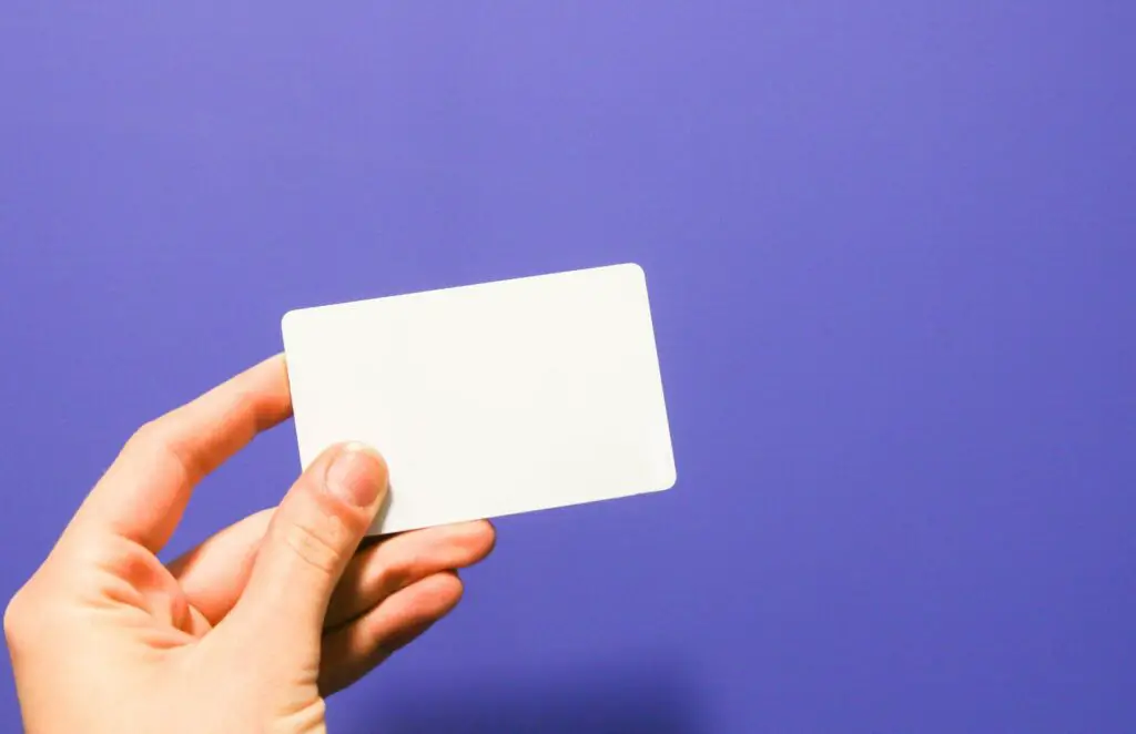 Person holding a card