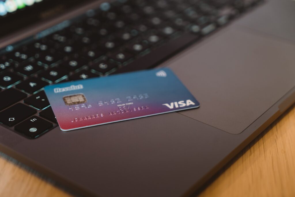 Visa credit card on a laptop